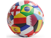 A soccer ball with many different flags on it