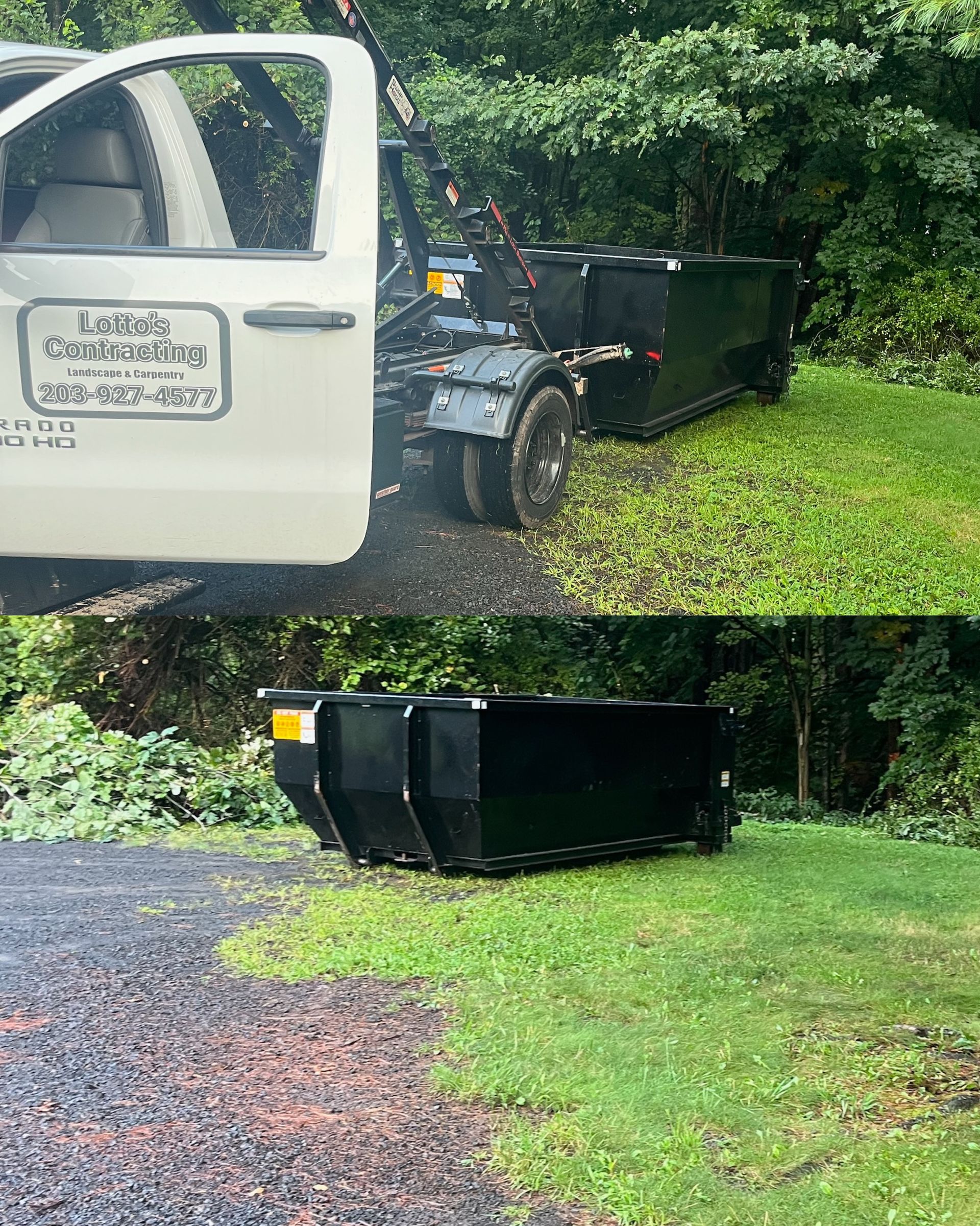 A dumpster is sitting in the grass next to a truck.