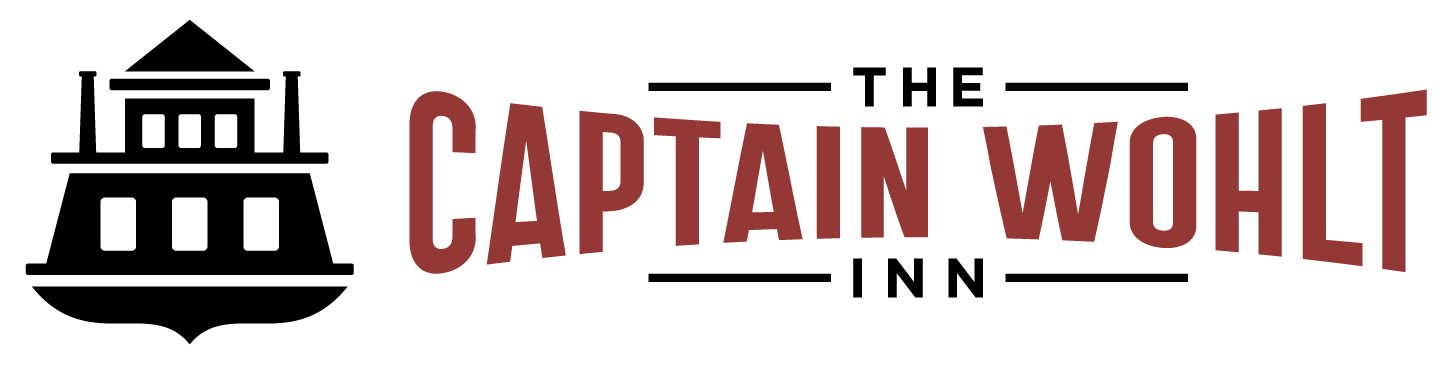 Logo for The Captain Wohlt Inn featuring a black silhouette of a riverboat next to the name in red text.