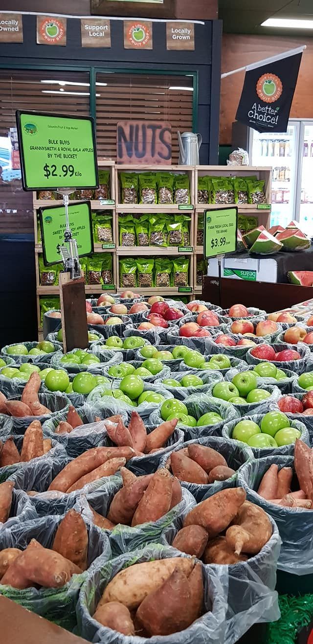 A Bunch Of Fruit Including Grapes And Apples — Caloundra Fruit Market In Caloundra, QLD