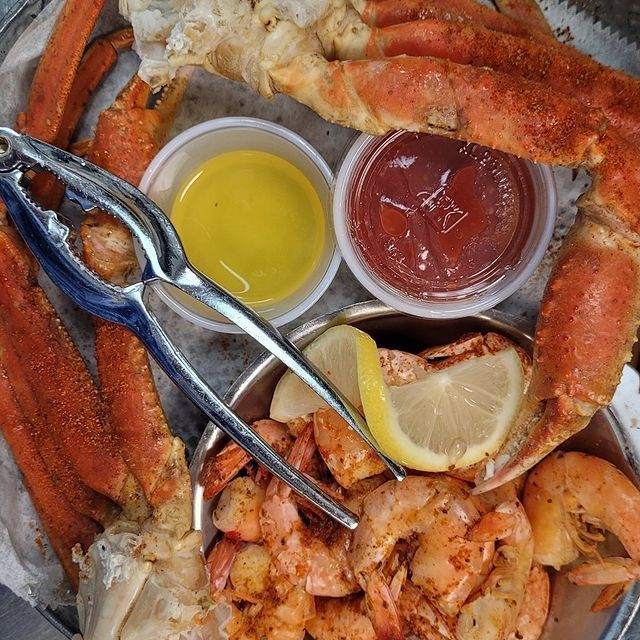 A Plate Of Crab Legs And Shrimp - Ocean Pines, MD - Don's Seafood & Chophouse