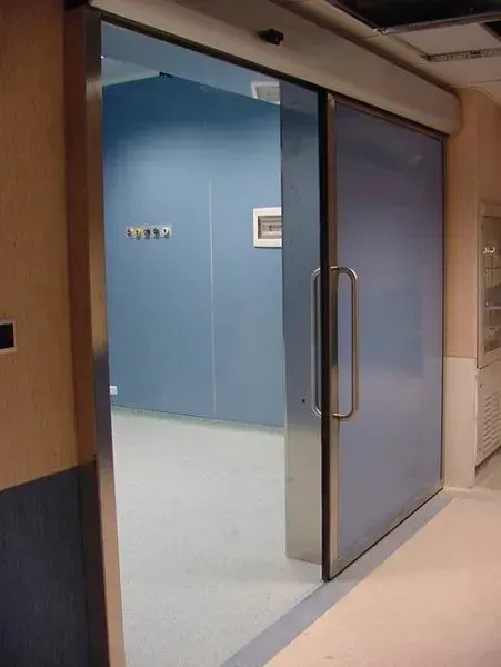 Porta scorrevole inox tamburata