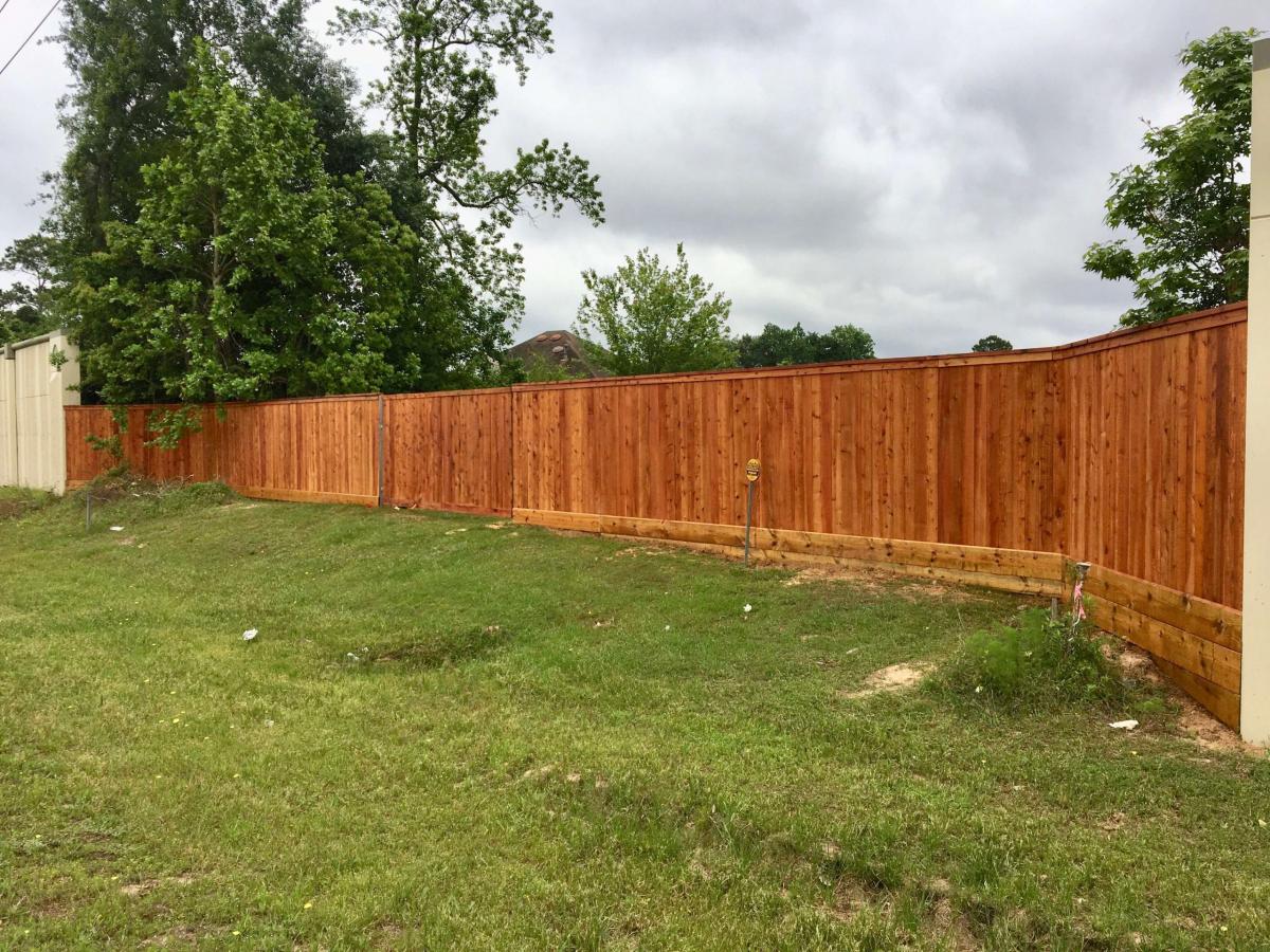 Stained Wooden Perimeter Fence — Pearland, TX — Fence Keeper