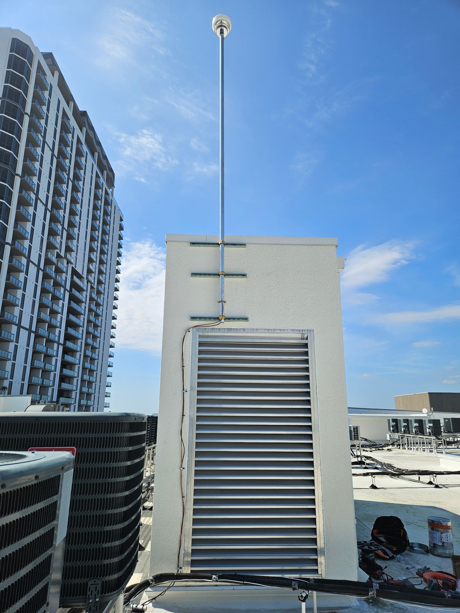 CMCE system installed on the roof of a high-rise condo building