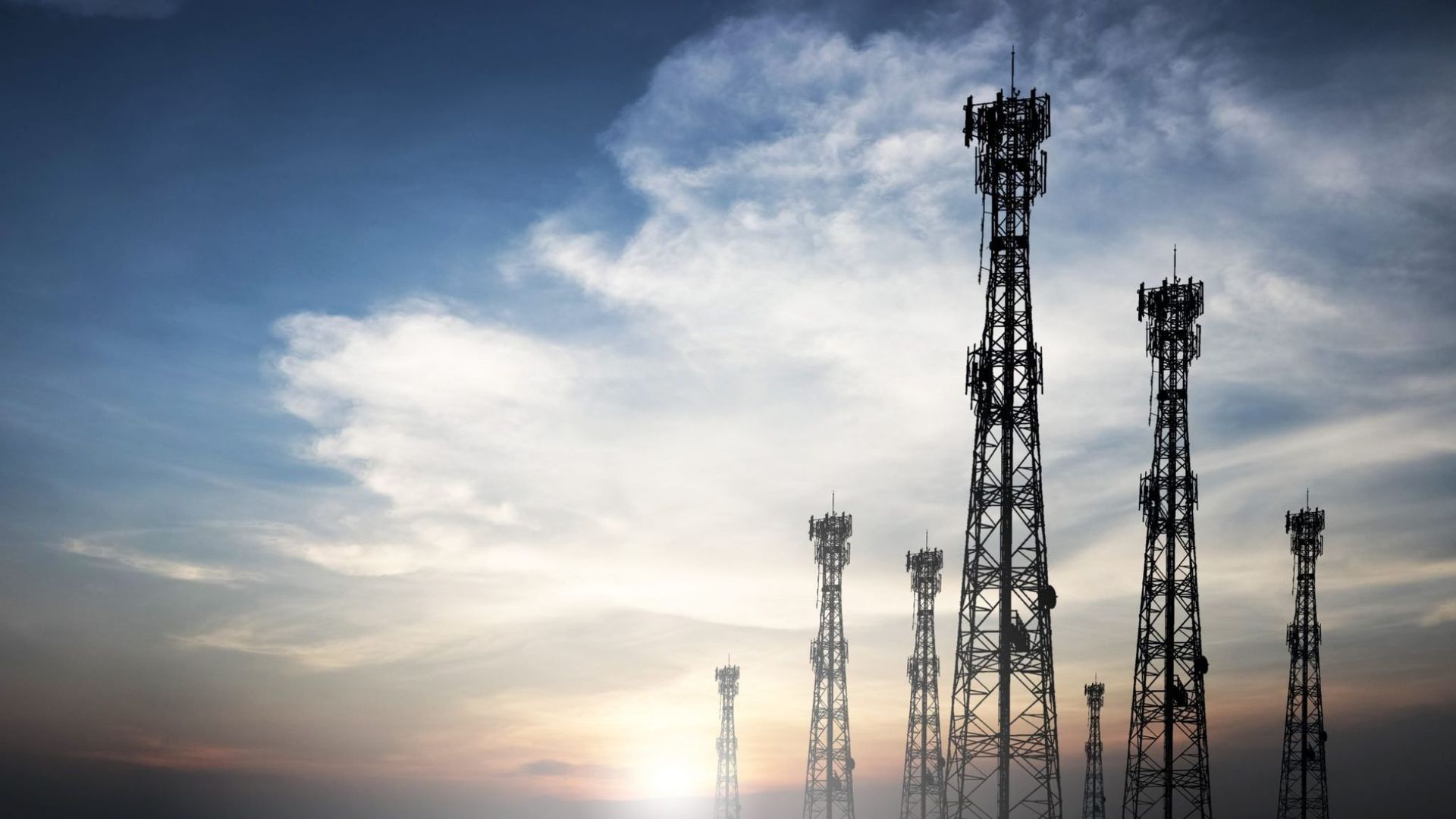 Telecommunication towers with the sunset