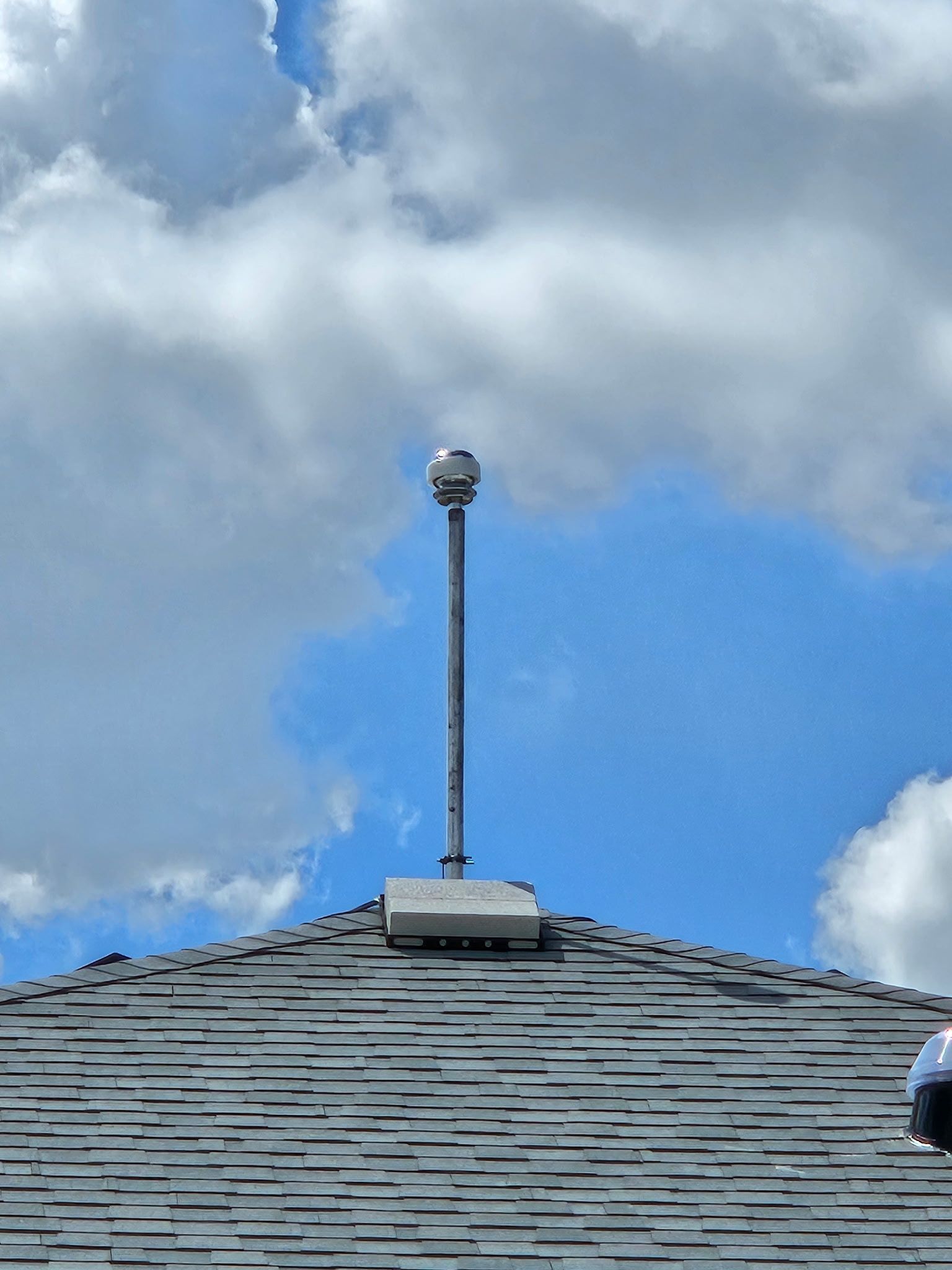 CMCE system mounted on the roof of a residential home