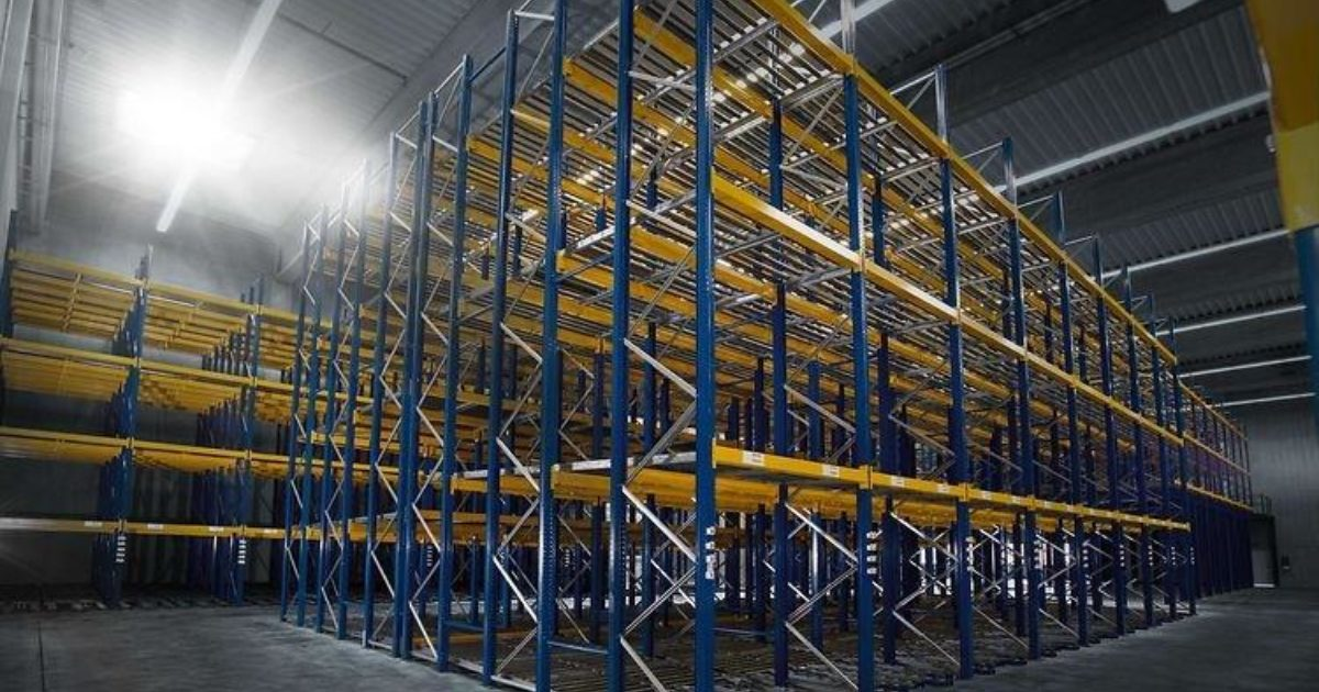 A large warehouse filled with lots of shelves and racks.