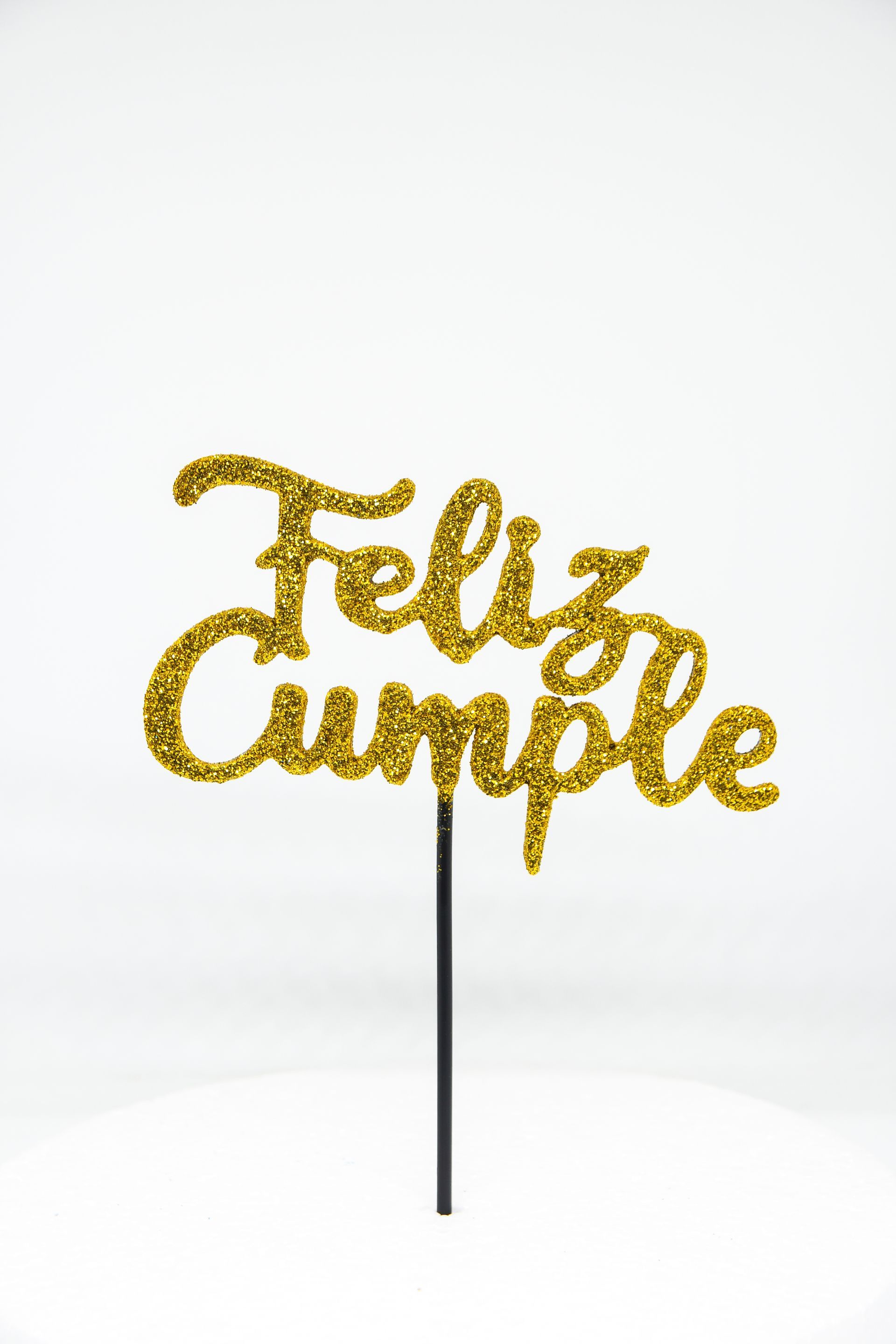 Adorno para pastel con purpurina dorada 