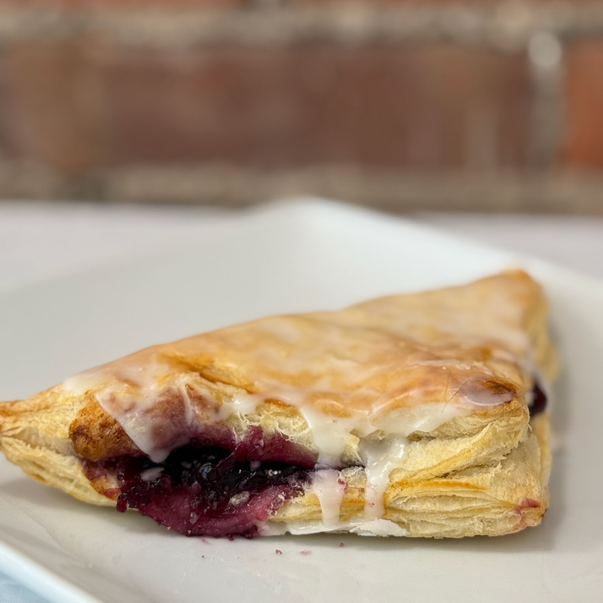 A close up of a pastry on a white plate