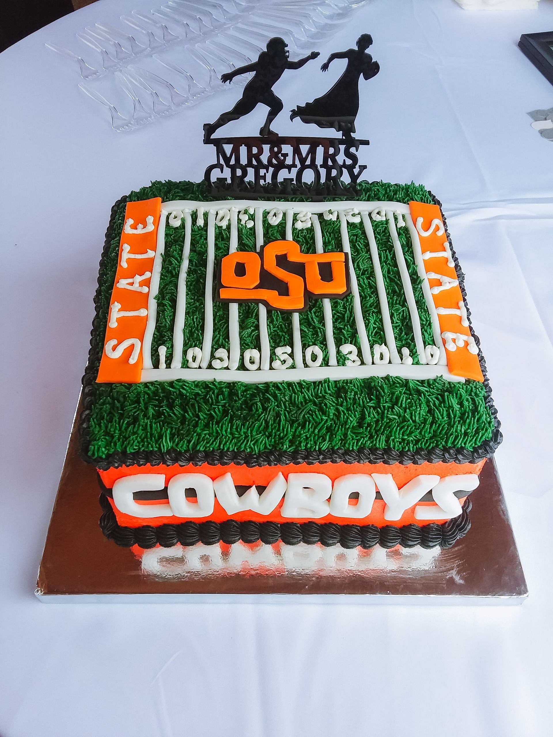 A cake with the word cowboys on it