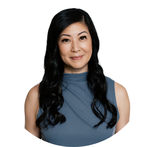 A woman with long black hair is wearing a blue tank top