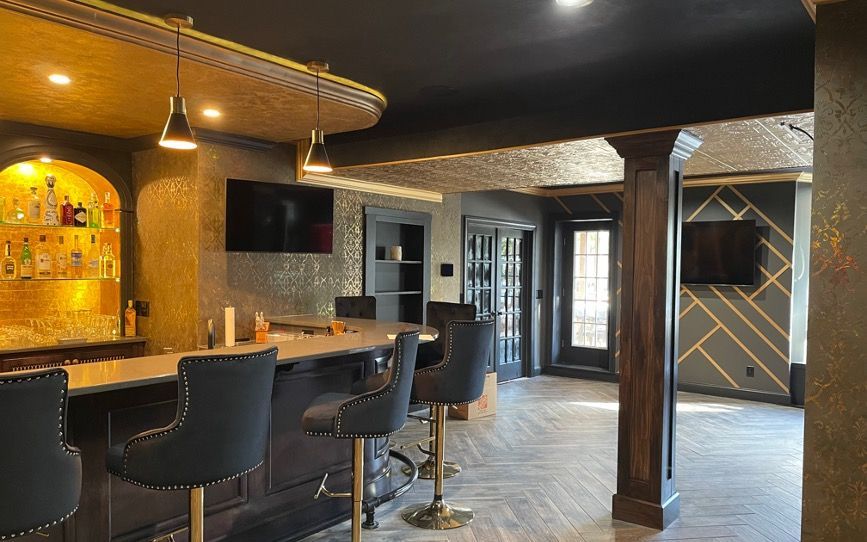 Layers of decorative paint and plaster applied to this luxurious bar area.