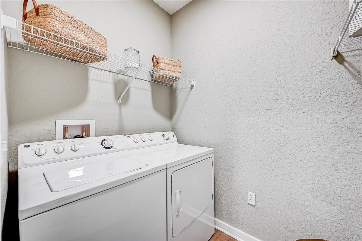 laundry room with a side-by-side washer and dryer