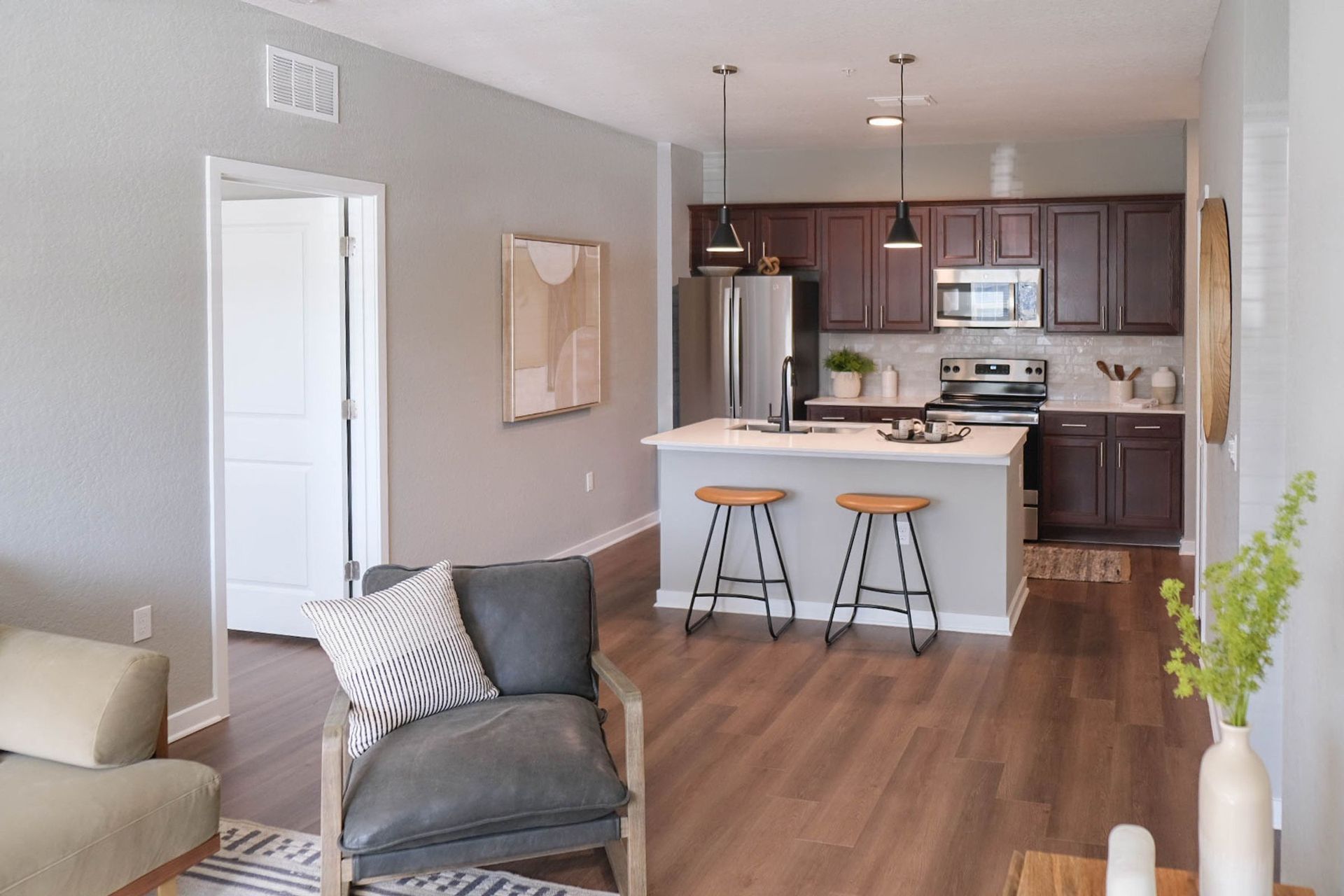 kitchen and living space at a Creekside Ranch apartment home in Bradenton, FL