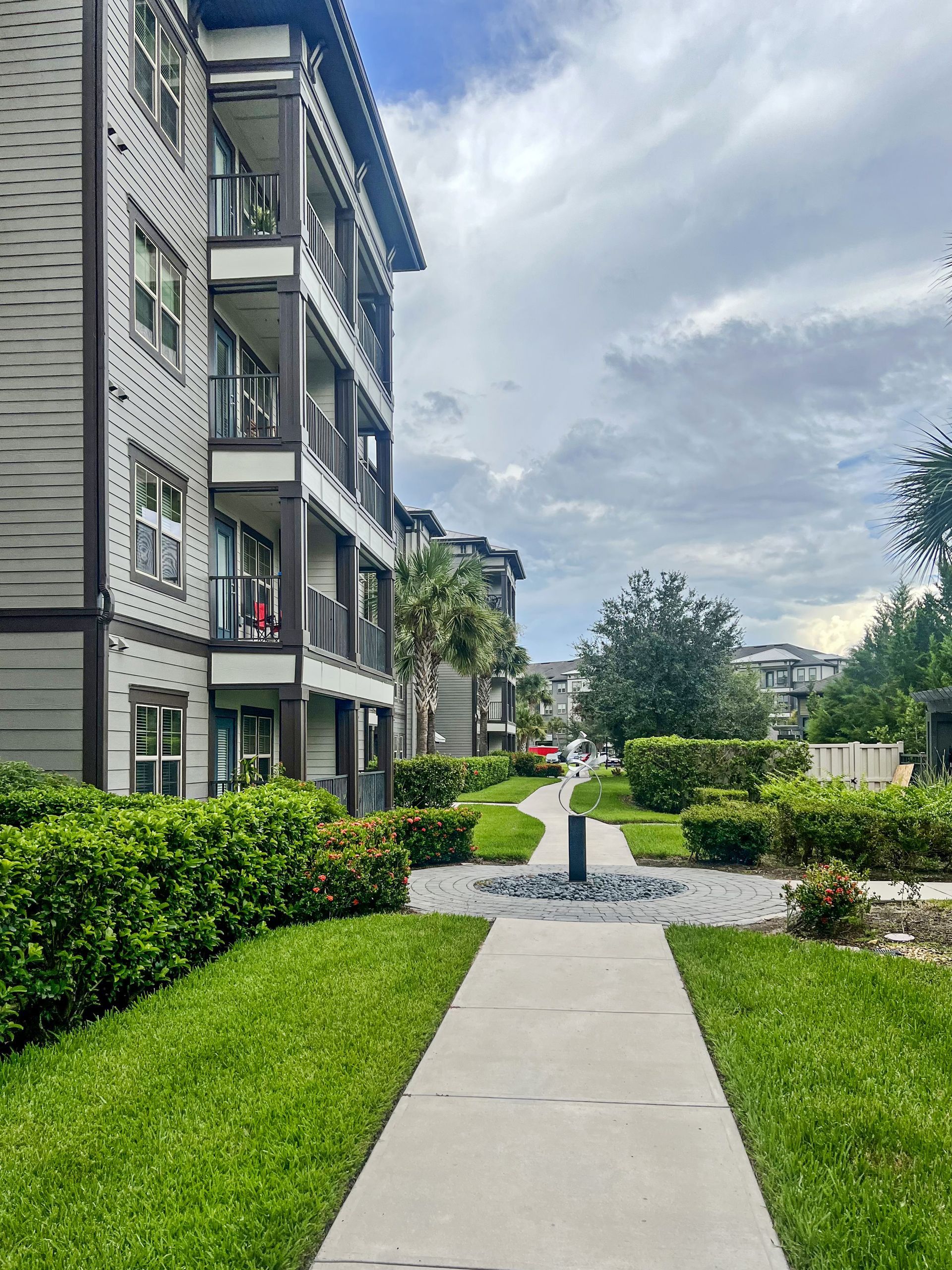 paved walking path outside of Creekside Ranch Apartments in Bradenton's Lakewood Ranch neighborhood 