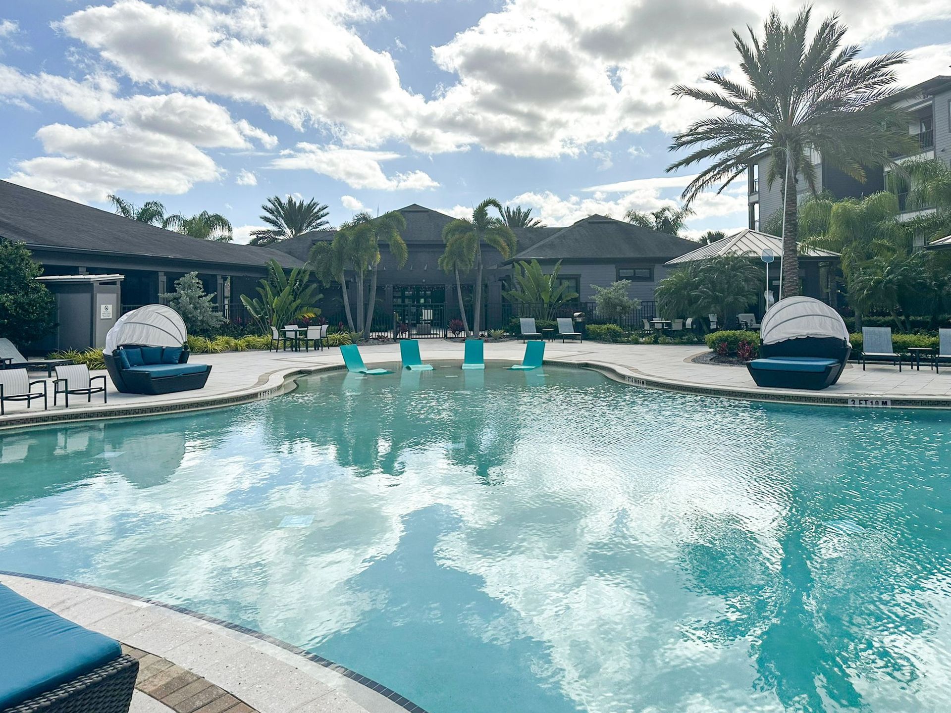 resort-inspired swimming pool outside of Creekside Ranch Apartments in Lakewood Ranch