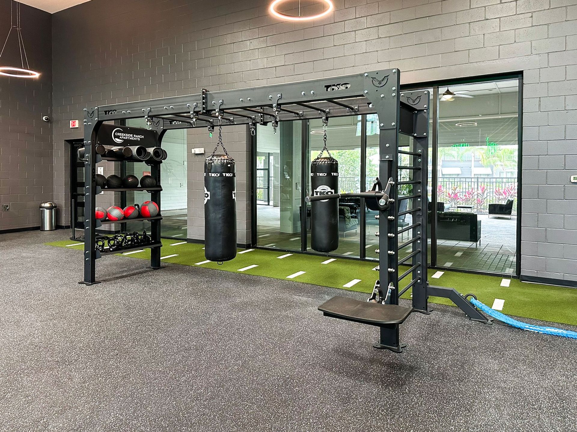 Creekside Ranch Apartments fitness center with CrossFit equipment