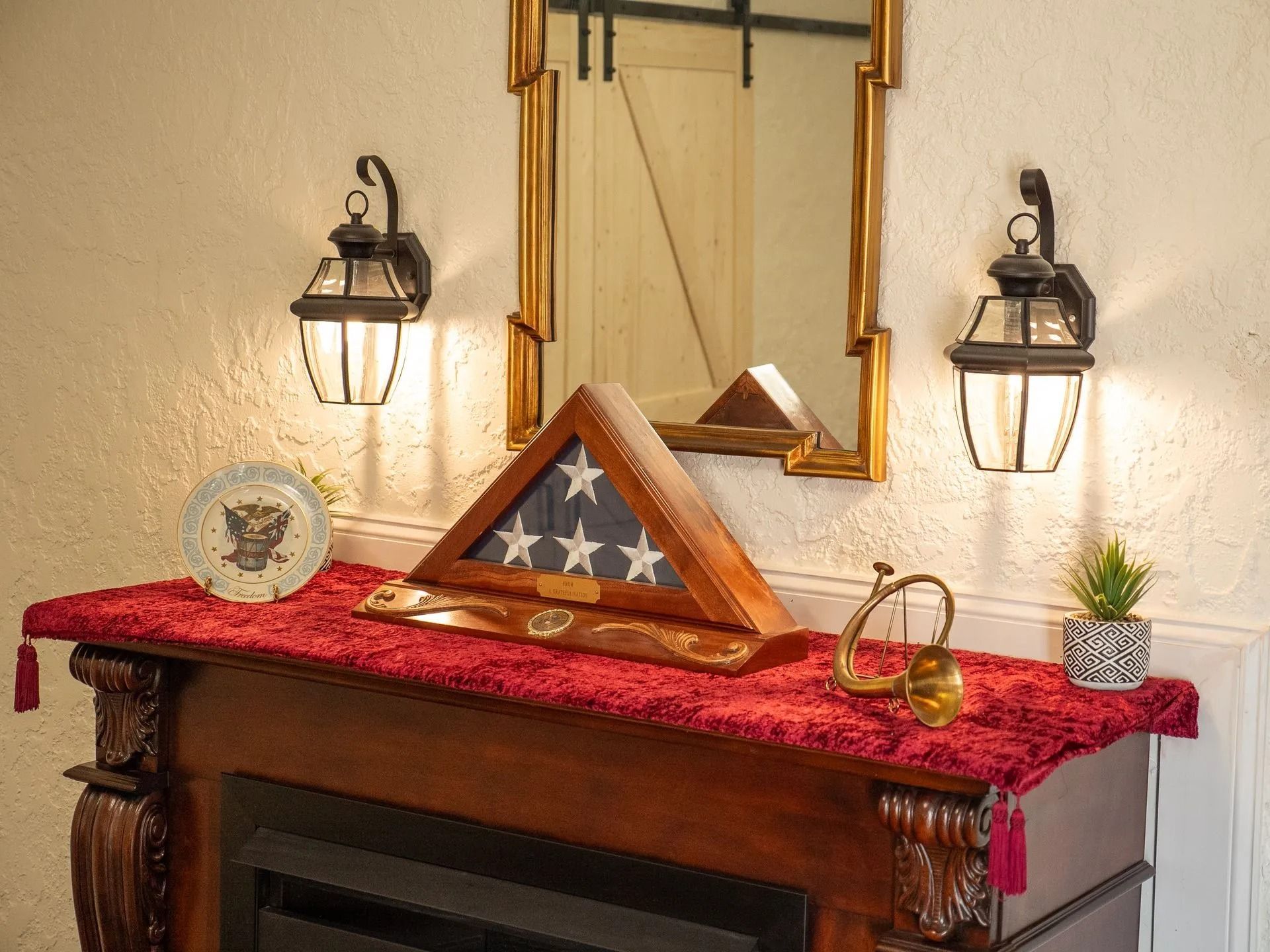 A fireplace with a flag on top of it