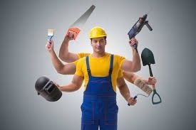 A construction worker with many hands holding different tools.