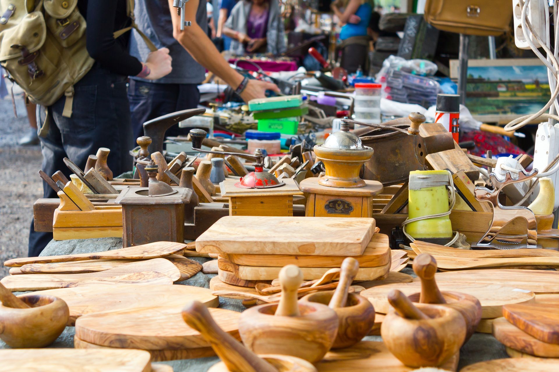 A table with a lot of wooden objects on it