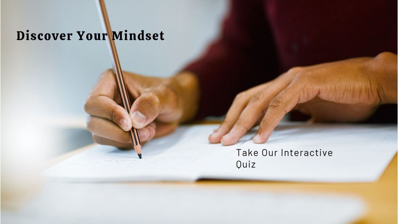 A person is writing on a piece of paper that says discover your mindset