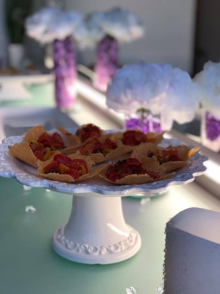 A plate of food is sitting on a table.