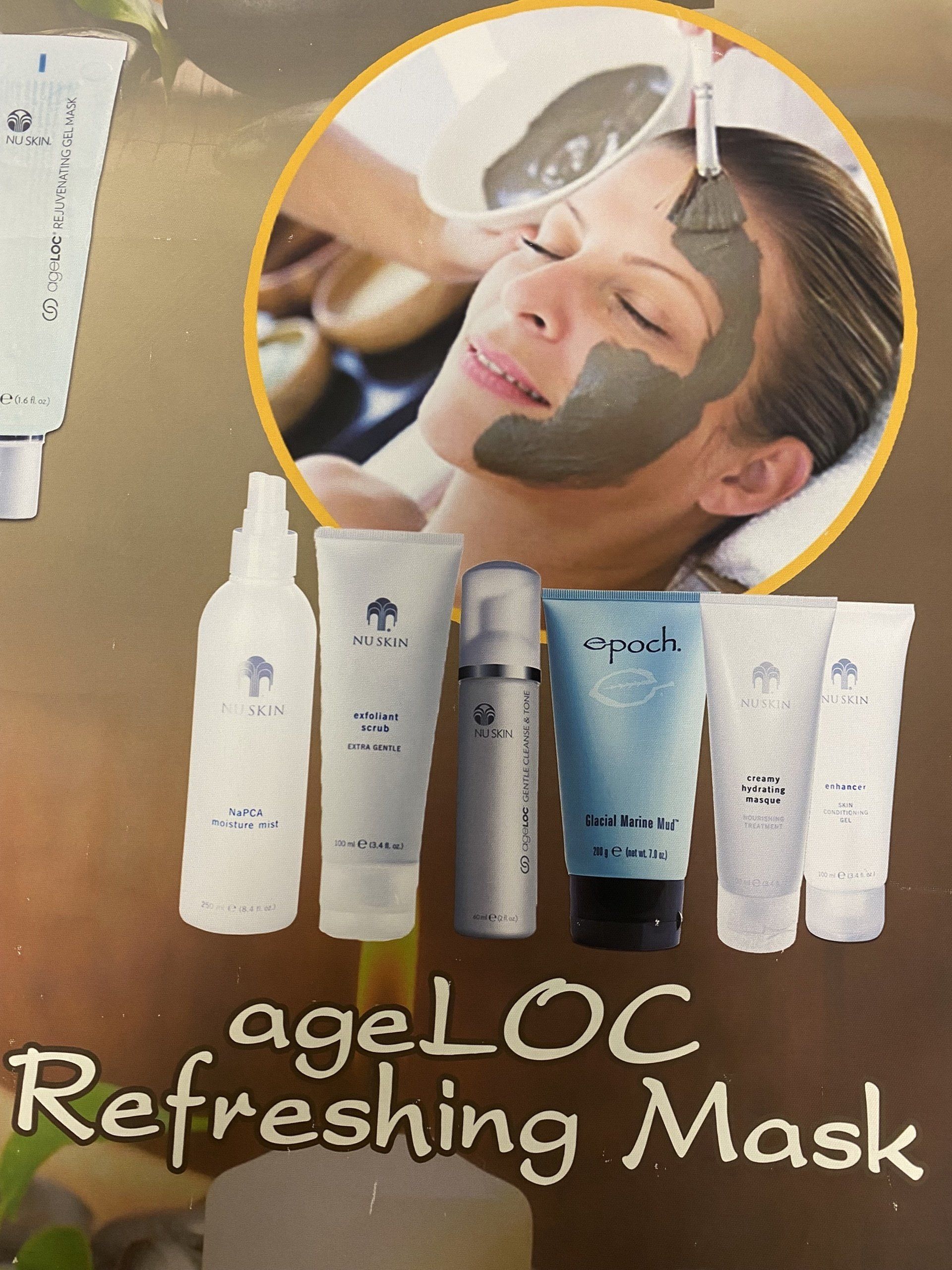 Woman getting facial mask; product line with tubes/bottles. Text: ageLOC Refreshing Mask.