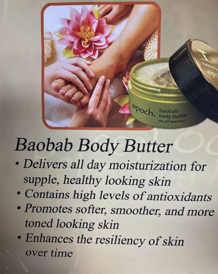 A jar of Baobab Body Butter, being used on a foot. The product claims to moisturize, contain antioxidants, and soften skin.