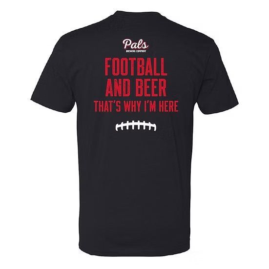 Black t-shirt with football player graphic. Player in a jersey is raising his arms and the phrase 