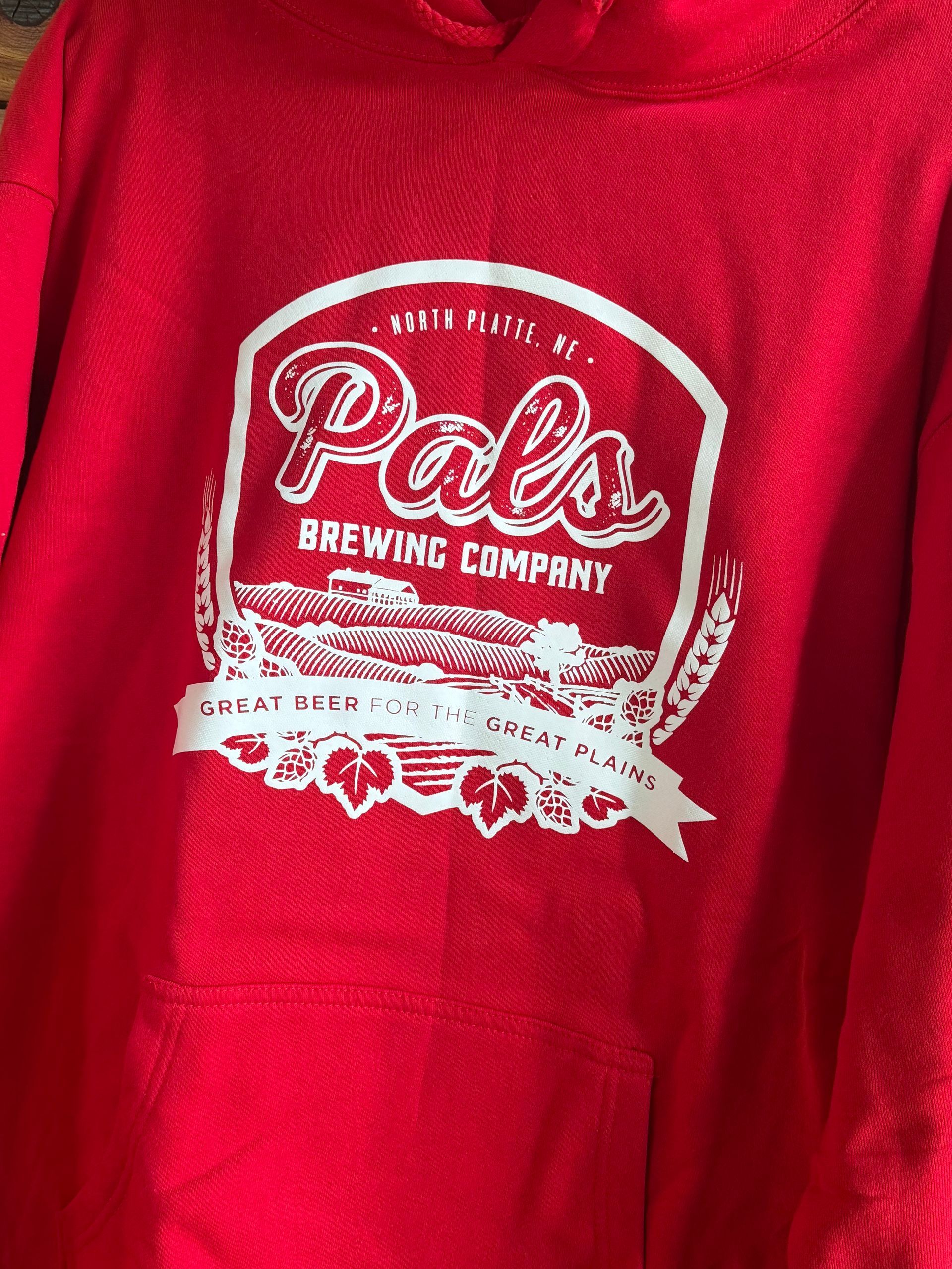 Red hoodie with a white logo for