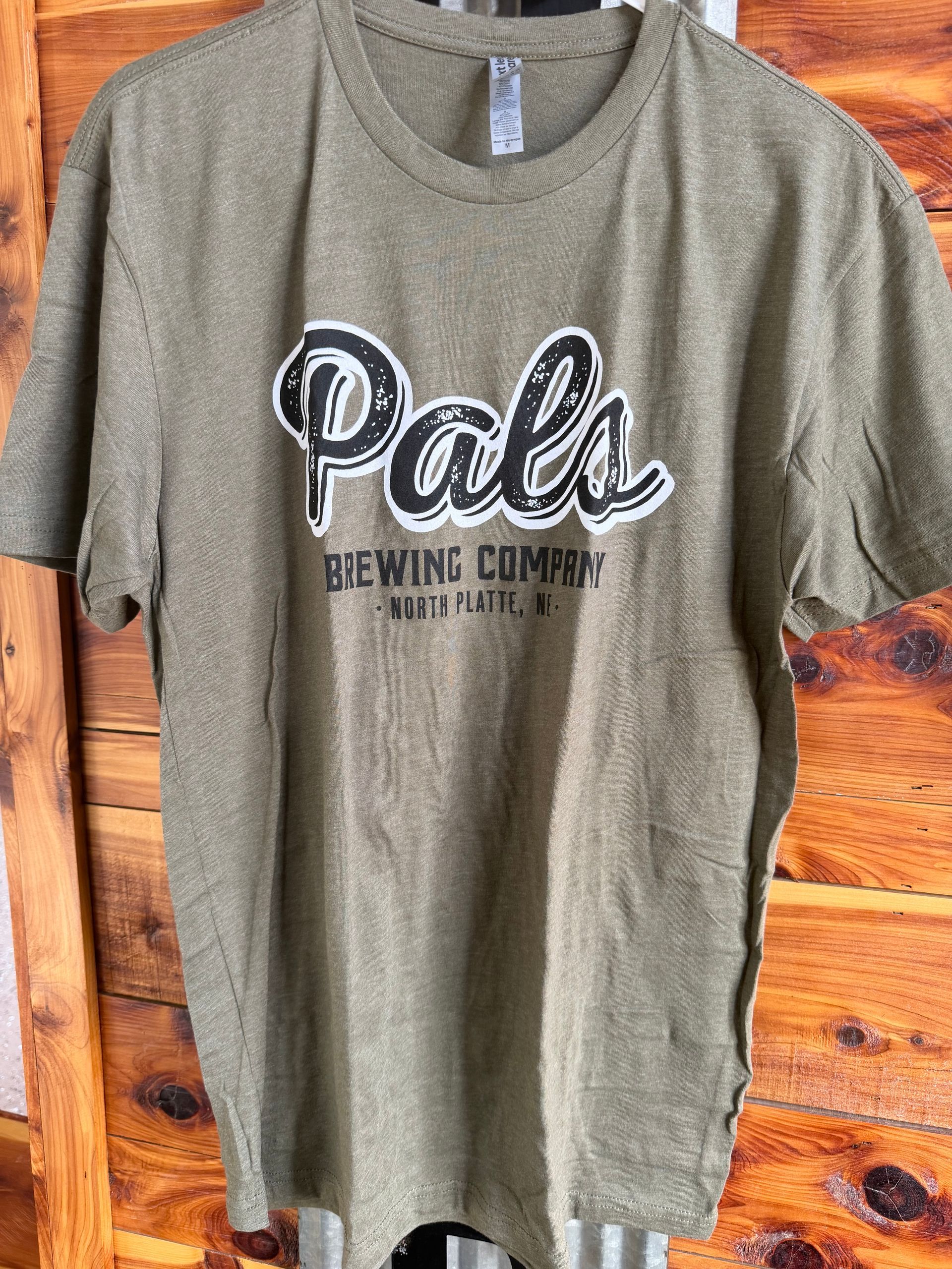 Green t-shirt with "Pals Brewing Company" logo in black and white text.