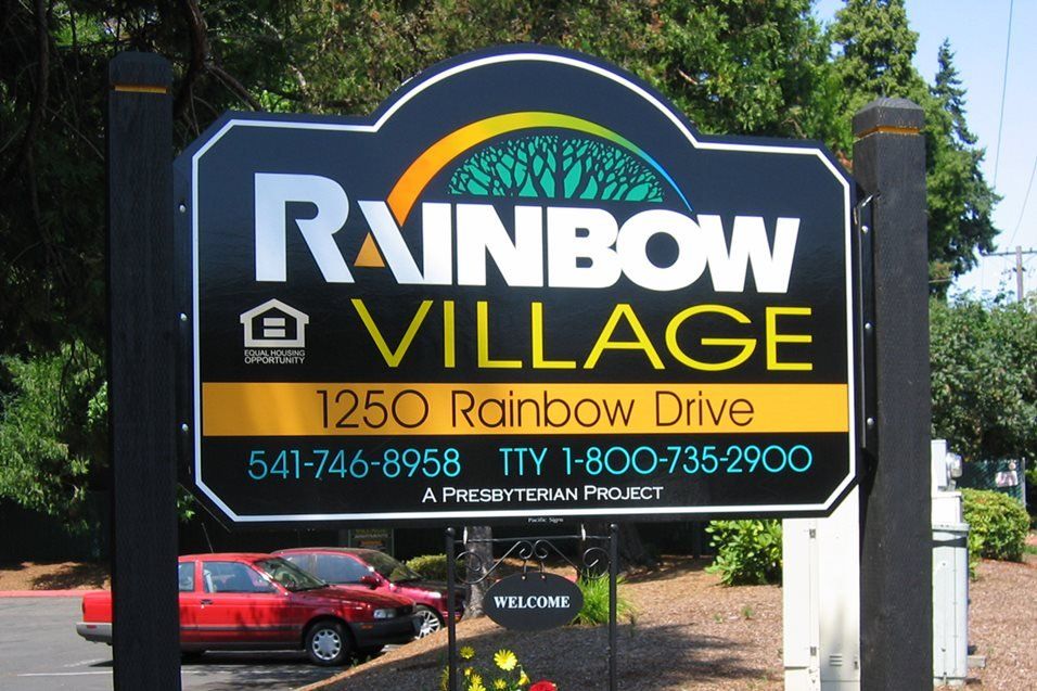 Rainbow Village_Sign