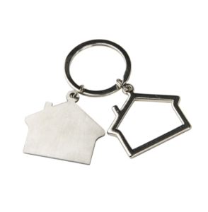 Two keychains in the shape of a house on a white background