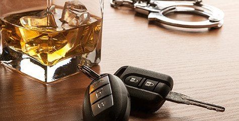 DWI Attorney — Glass of Whiskey with Car Keys & Handcuffs in San Antonio, TX