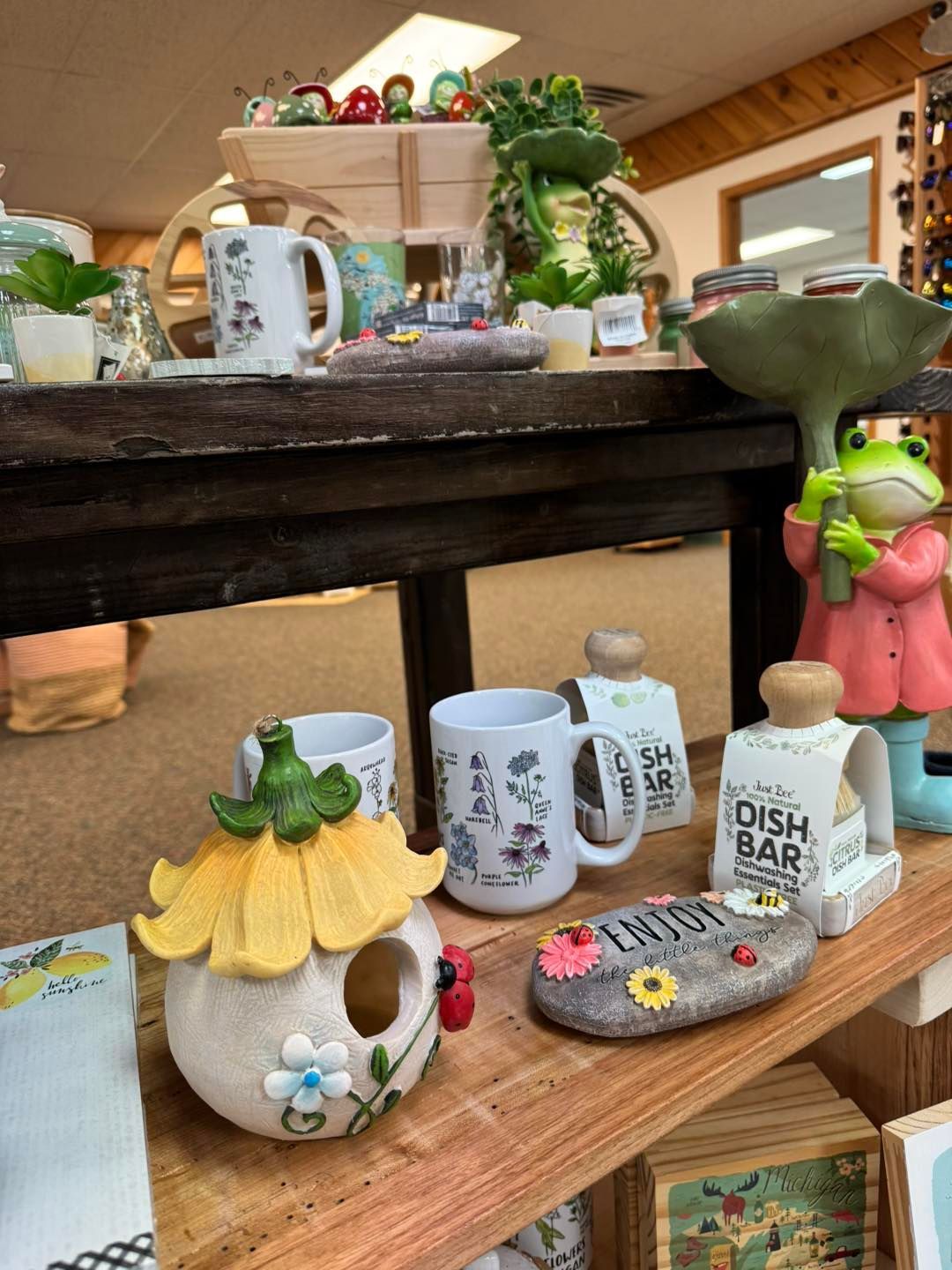 A table with a variety of ceramic items on it.