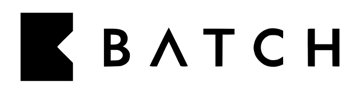 Black logo with a black square containing a white chevron,