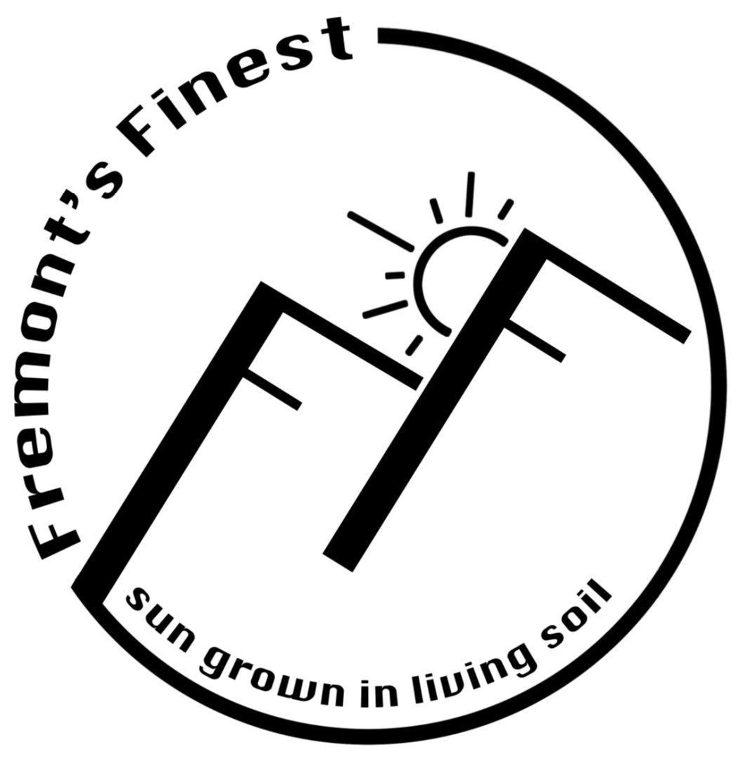 Logo with mountains, sun, and text