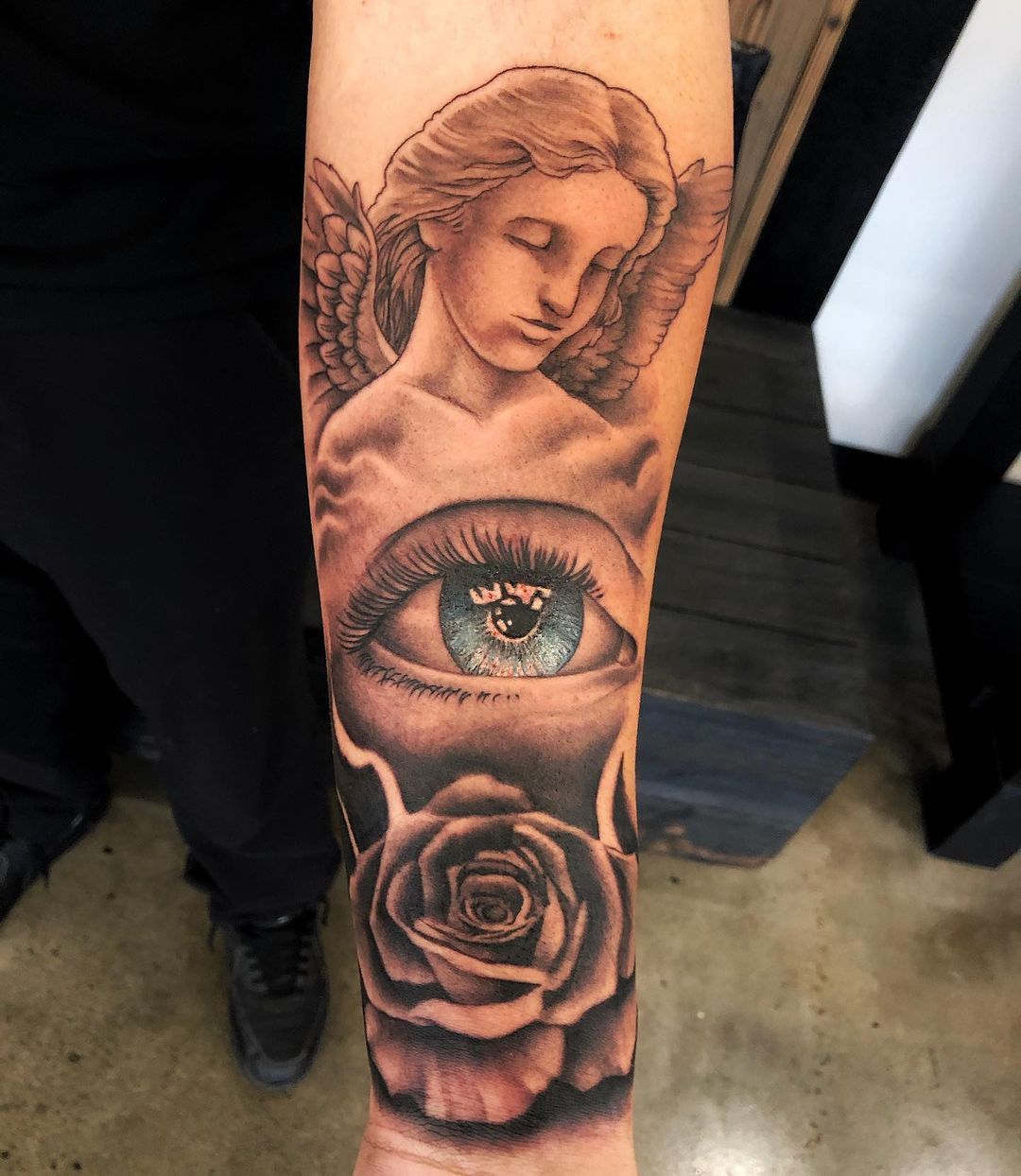 Angel, Eye and Rose Tattoo by Chad Lavers at Crimson Empire Tattoo in Edmonton Alberta Canada