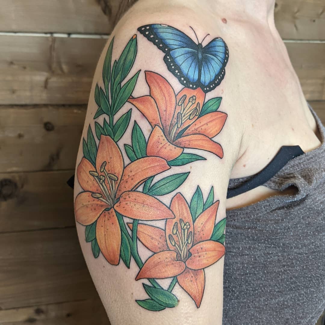 Butterfly and Floral Tattoo by Sheila Anderson at Crimson Empire Tattoo in Edmonton Alberta Canada