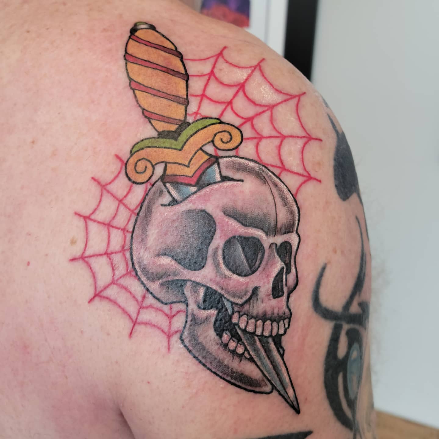 Skull and Dagger Tattoo by Sheila Anderson at Crimson Empire Tattoo in Edmonton Alberta Canada