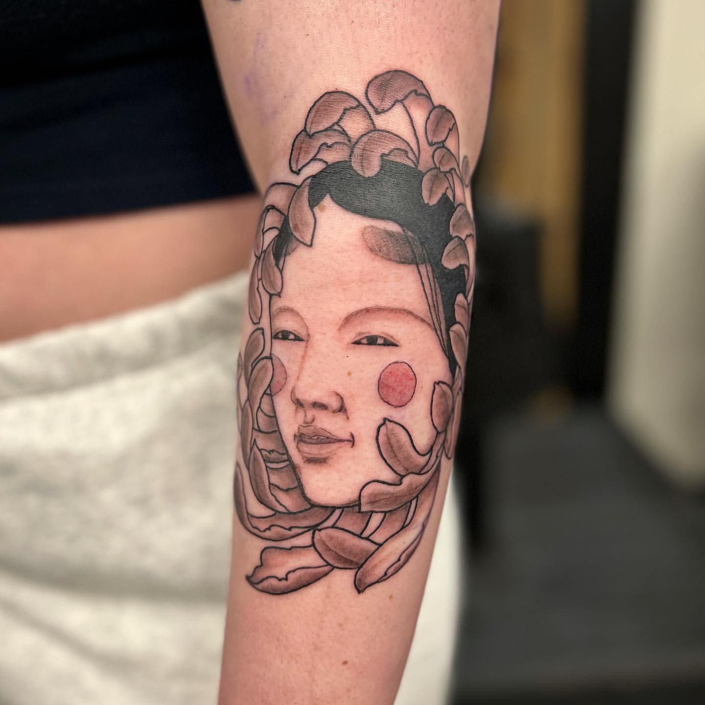 Noh Mask and Chrysanthemum Tattoo by Vinny Nguyen at Crimson Empire Tattoo in Edmonton Alberta Canada