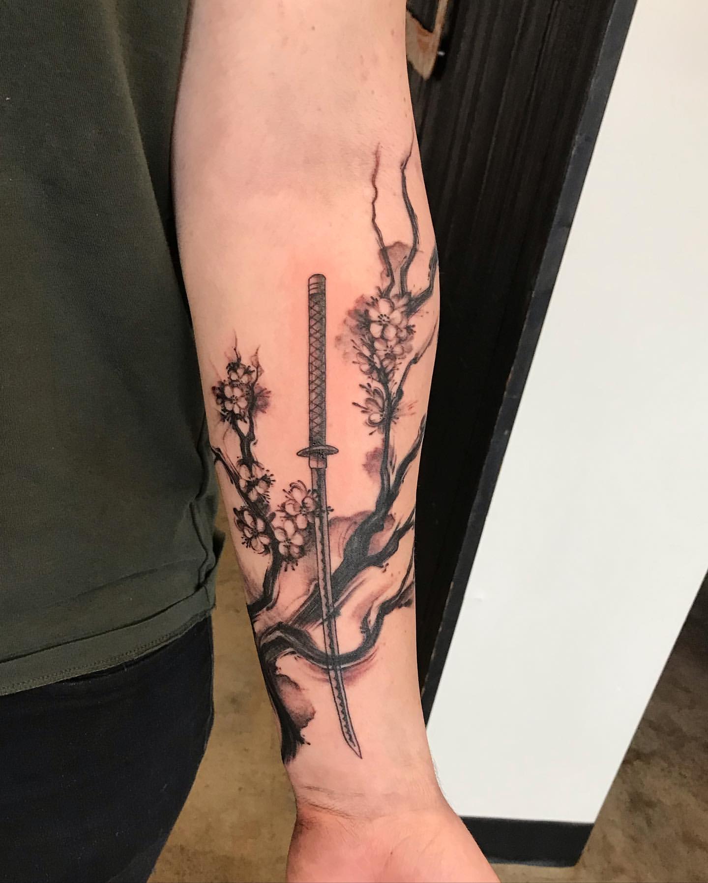Cherry Blossom and Katana Tattoo by Adrienne Alexander at Crimson Empire Tattoo in Edmonton Alberta Canada