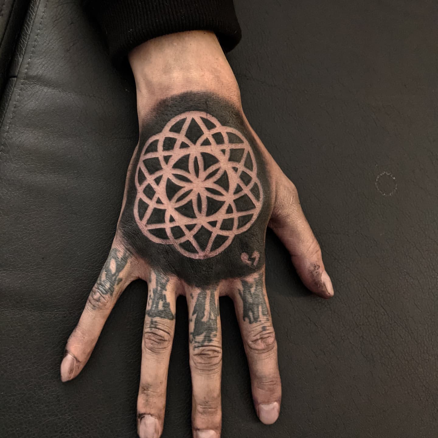 Geometric Hand Tattoo by Amber Strange at Black Gold Tattoo Co in Edmonton Alberta Canada