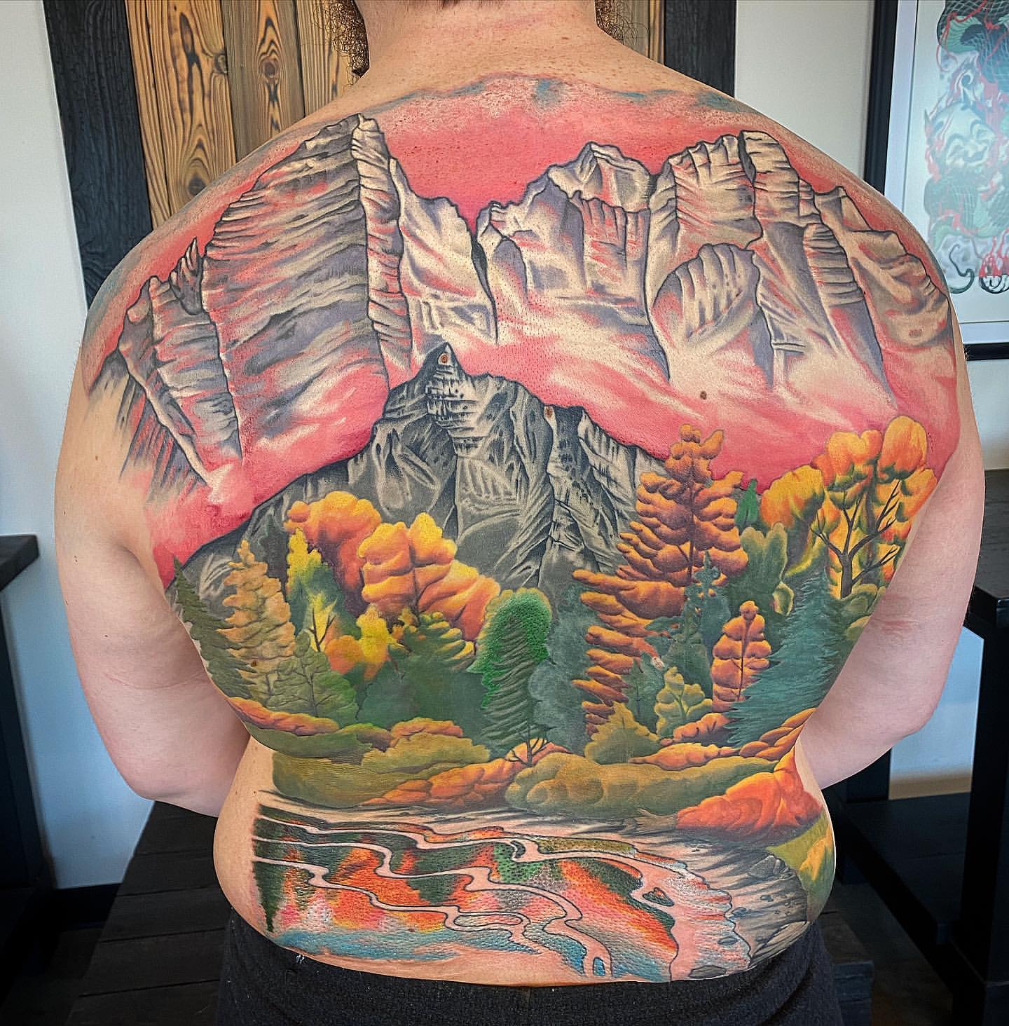 Mountain Scenery Backpiece by Dale Moostoos at Crimson Empire Tattoo in Edmonton Alberta Canada