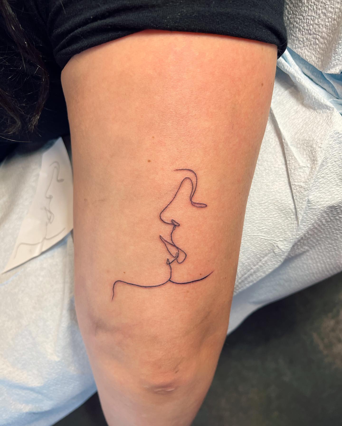 Fine Line Lovers Kiss Tattoo by Vinny Nguyen at Crimson Empire Tattoo in Edmonton Alberta Canada
