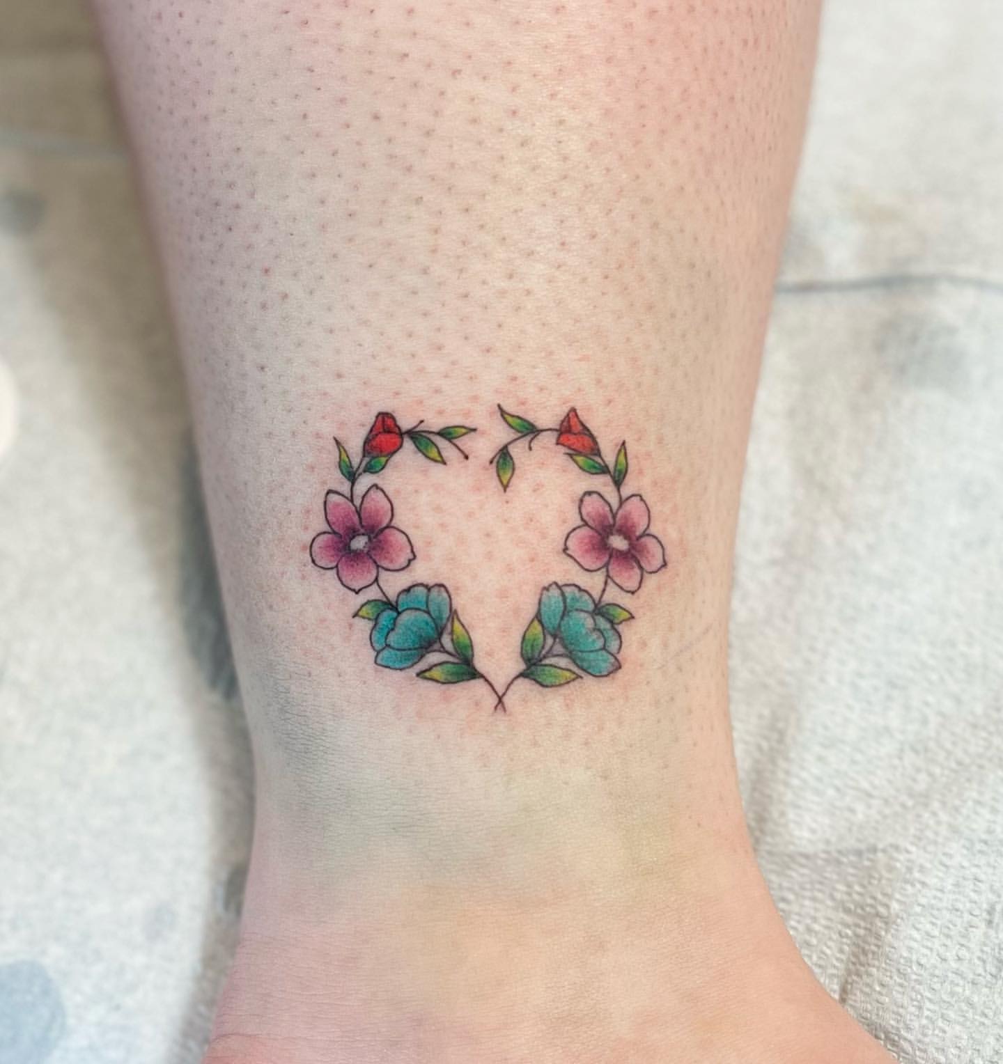 Floral Heart Tattoo by Vinny Nguyen at Crimson Empire Tattoo in Edmonton Alberta Canada