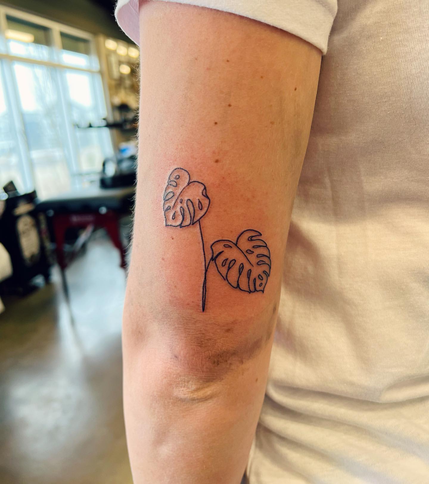 Monstera Leaves Tattoo by Vinny Nguyen at Crimson Empire Tattoo in Edmonton Alberta Canada