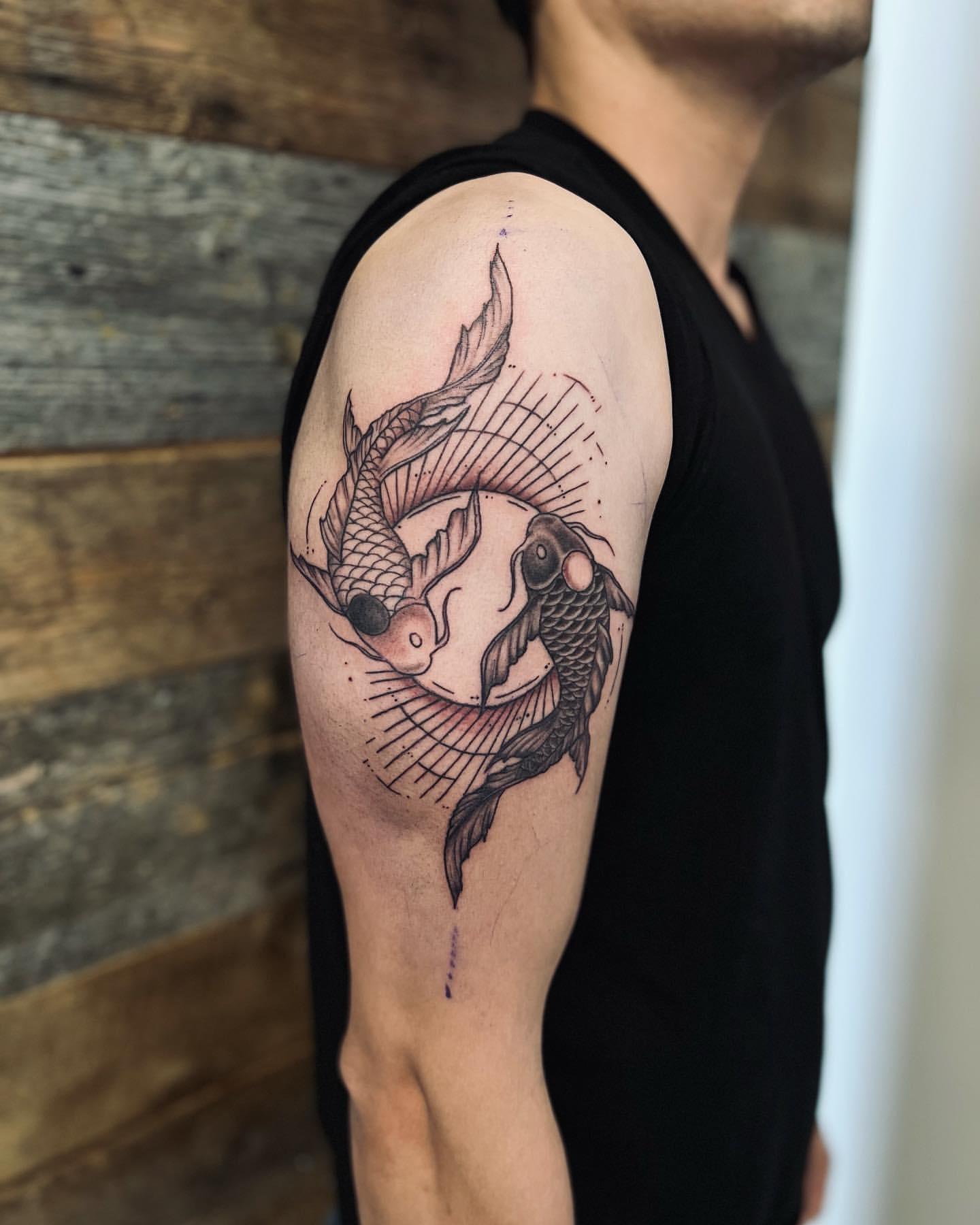 Yin Yang Koi Fish Tattoo by Vinny Nguyen at Crimson Empire Tattoo in Edmonton Alberta Canada