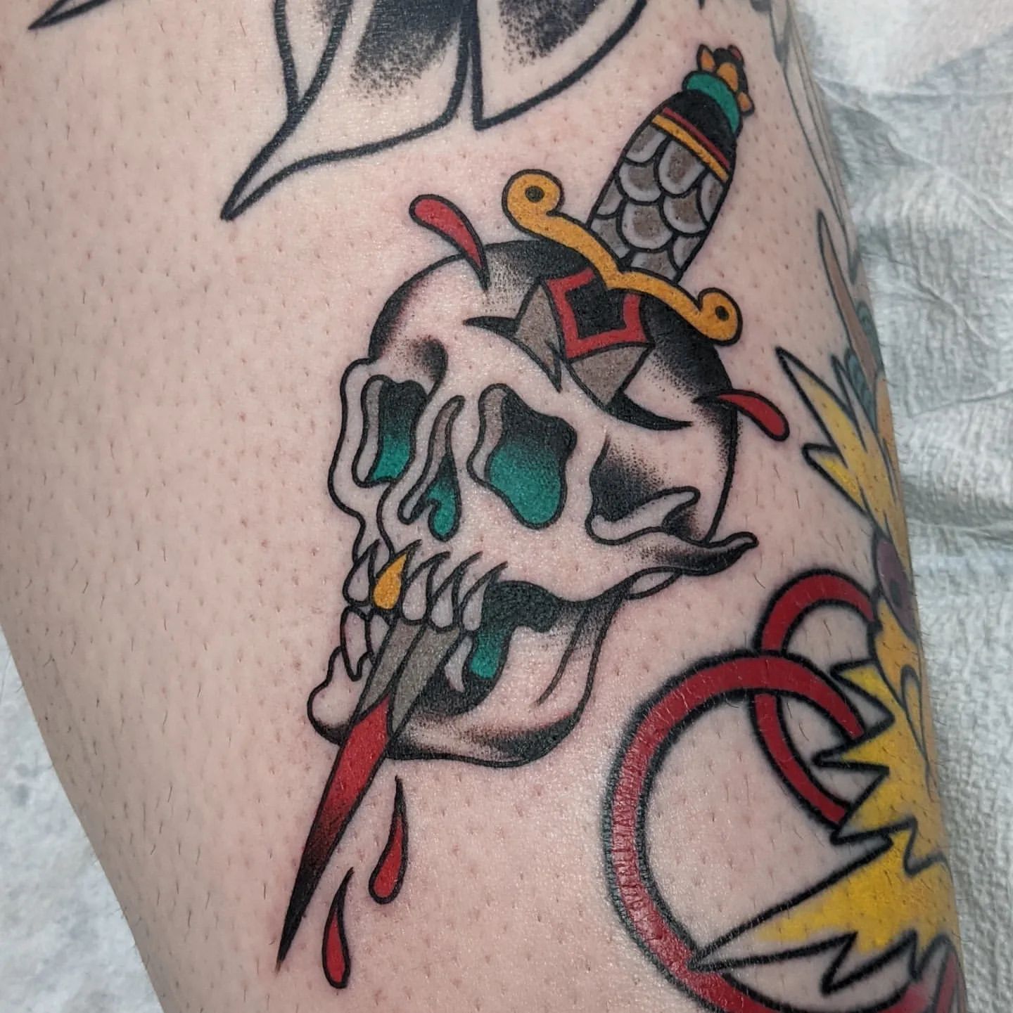 Skull and Dagger Tattoo by Chris Benson at Silver Ghost Tattoo in Edmonton Alberta Canada