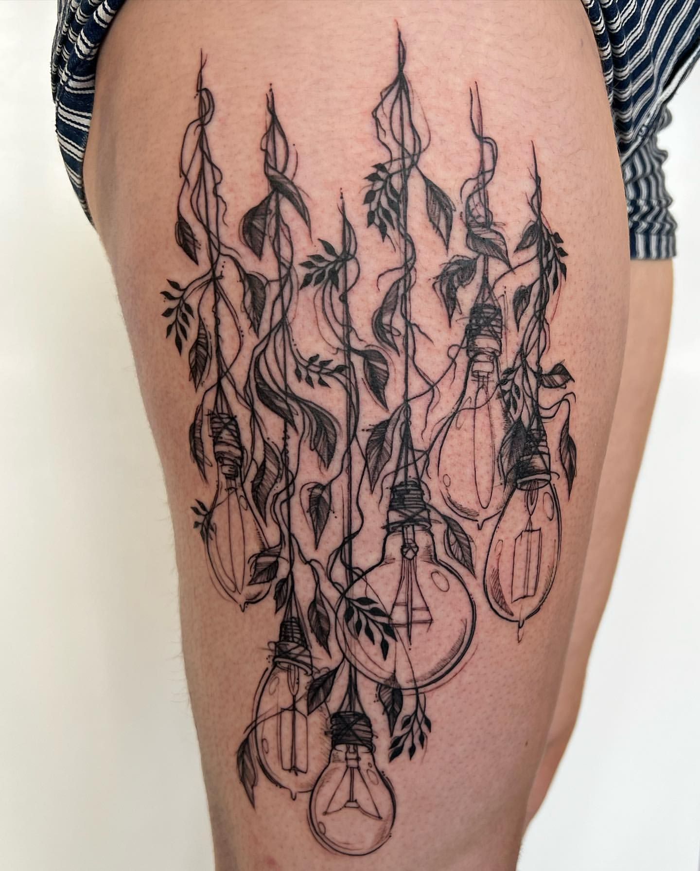 Lights and Floral Tattoo by Adrienne Alexander at Silver Ghost Tattoo in Edmonton Alberta Canada
